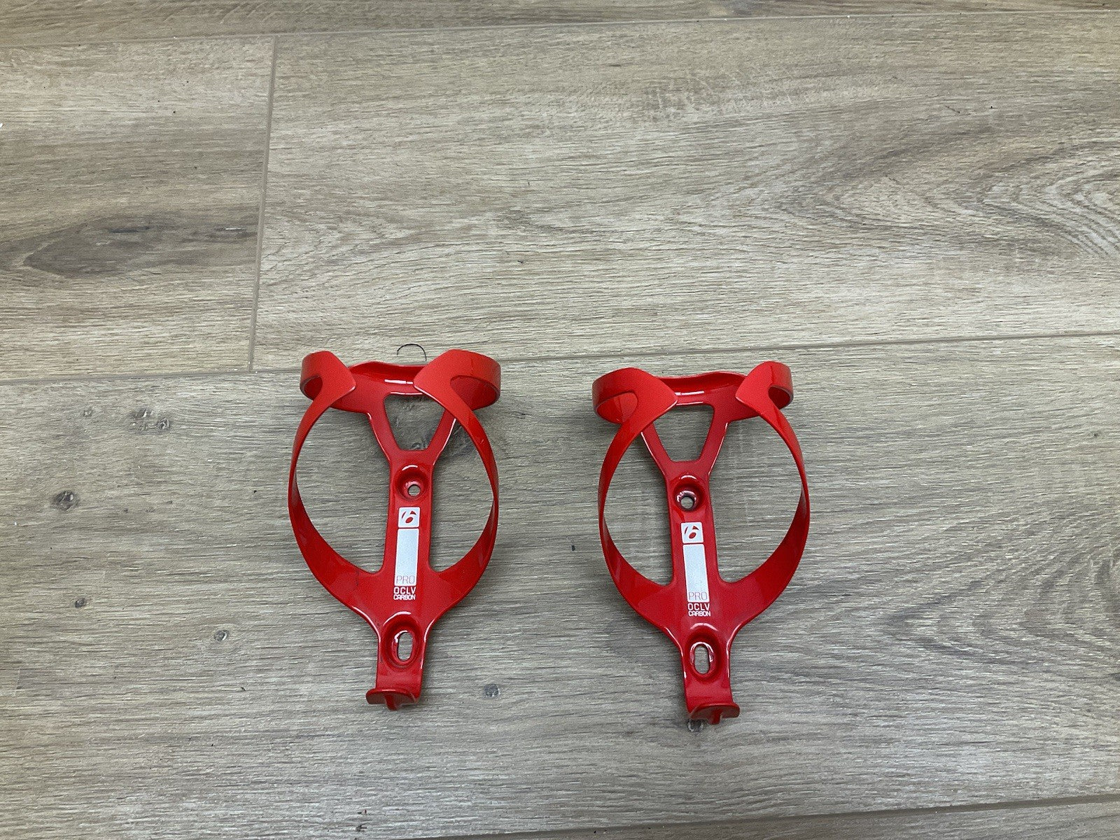 Bontrager Pro Oclv Carbon Fiber Water Bottle Cages Pair Glossy Red